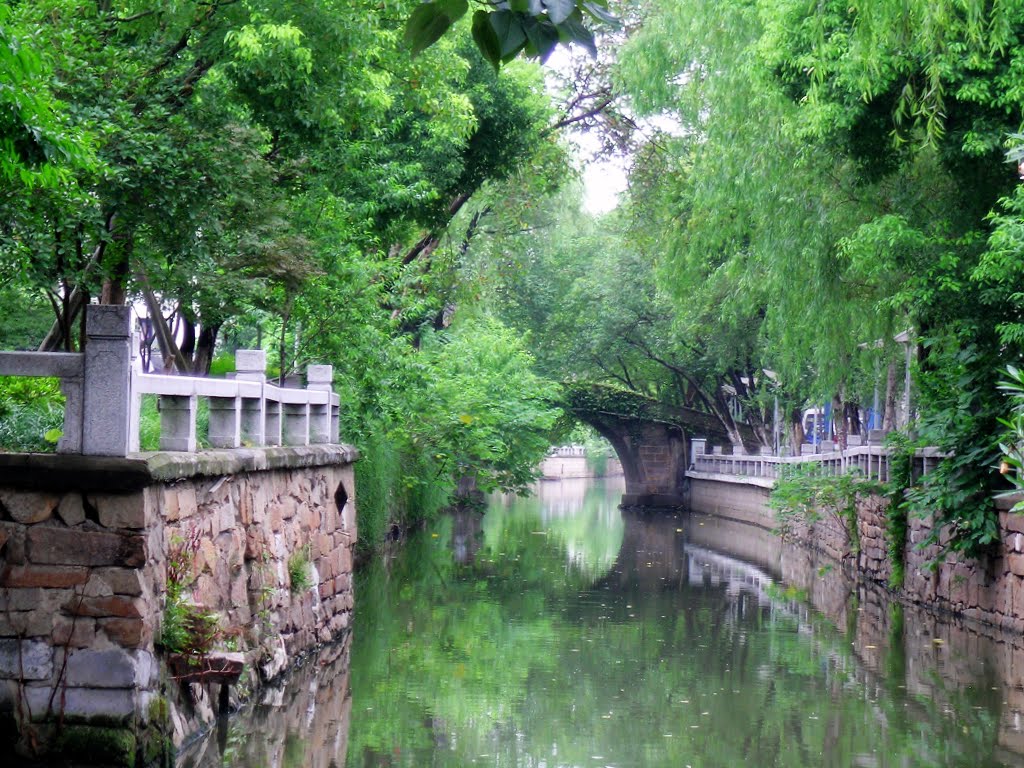 Достопримечательность Сучжоу - мост и каналы города
